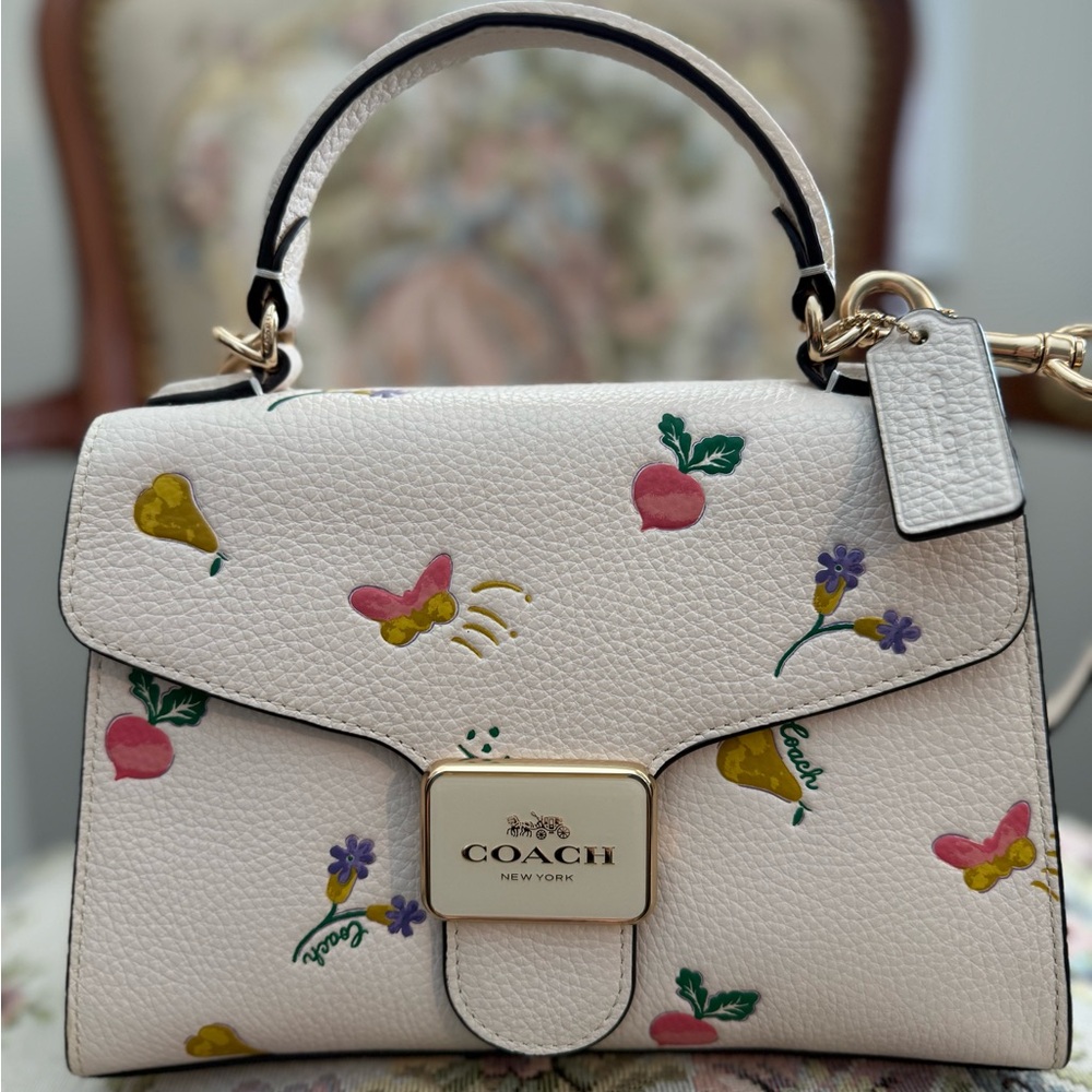 Coach White Satchel with Gold Hardware and Patterned Design